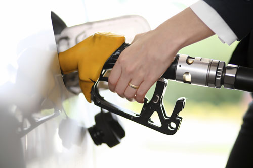 Pumping gas into a vehicle